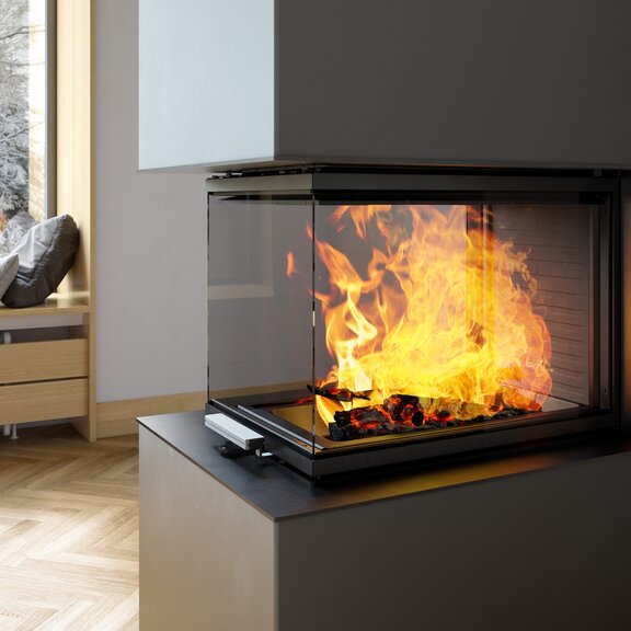 Chambre de combustion de la cheminée à bois VISIO 3:1 ST avec vue sur les grandes flammes de 3 côtés
