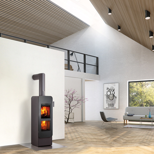 bionic fire EVO en noir avec porte en acier Poêle à bois bionic fire EVO de couleur noire avec porte en acier dans un loft moderne