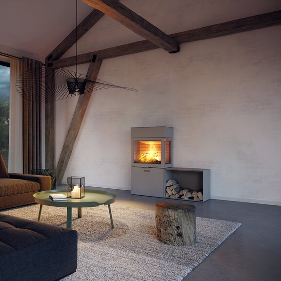 Poêle à bois MAX 600/130 en nickel avec deux vitres latérales et banc dans un élégant salon dans les tons bruns