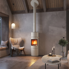 VIVA 140 L de couleur sable avec porte en acier Poêle à bois VIVA 140 L de couleur sable avec porte en acier dans un appartement moderne dans les tons de terre