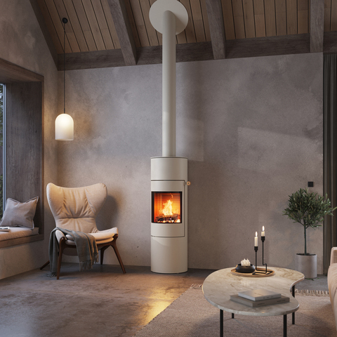 Poêle à bois VIVA 140 L de couleur sable avec porte en acier dans un appartement moderne dans les tons de terre